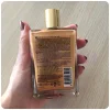 قیمت خرید و فروش روغن مرطوب کننده شاین دار صورت و بدن و مو بیوکسین مدل Gold On Skin حجم 100 میلی لیتر